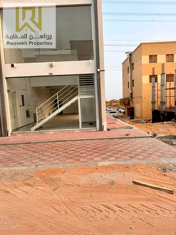 Commercial Showroom for Rent | Corner Unit | Ground Floor + Mezzanine | Prime Location in Al Yasmeen, Ajman
