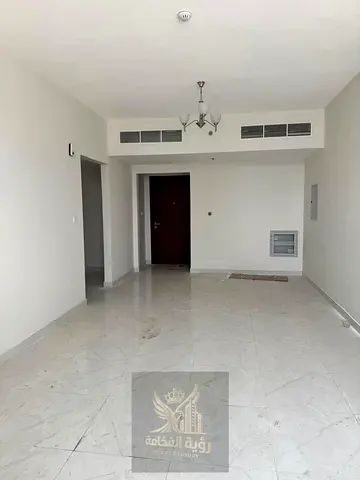 Beautiful two-bedroom apartment with a living room for annual rent in Al Mamzar/Al Taawun, first occupancy, with 3 bathrooms, balcony, and a stunning