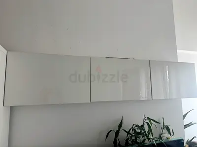 White single-door cabinet / wardrobe shelf - good condition