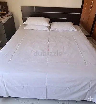 Queen bed frame with headboard and mattress (used) - simple design