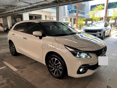 2024 Suzuki Baleno GLX White for sale. FSH with Suzuki Al Rostamamo