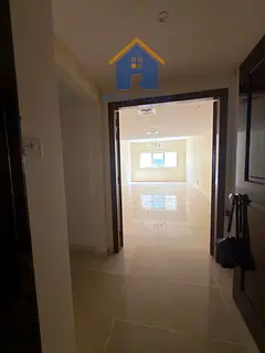 Two bedrooms with a laundry room for sale in Al Taawun