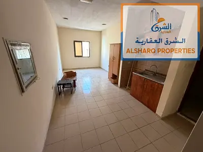 Large studio apartment for annual rent in Al Nuaimiya 2, central air conditioning, at a reasonable price with payment facilities.
