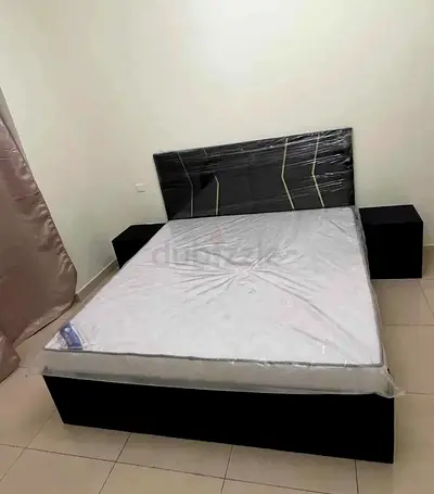 Queen bed frame with headboard and 2 matching nightstands - black