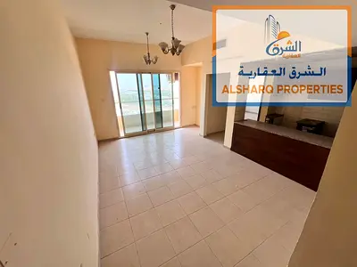 1BHK in Emirates City, Al Amra, master room, 2 bathrooms, balcony, AED 25K yearly.