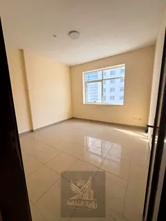 A stunning two-bedroom apartment with a living room for annual rent in Al Khan, featuring two bathro