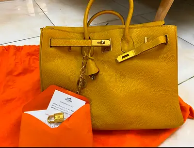 Many leather tote bags with hardware - preowned