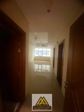Spacious apartment with a master bedroom, built-in wardrobes, and central air conditioning in a pri