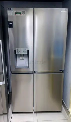 Hisense side by side Stainless Steel Refrigerator with Water Dispenser -ice maker good working condi