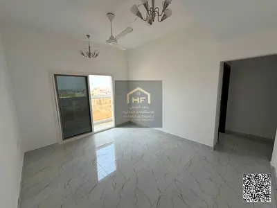 Spacious 1-Bedroom Apartment with Separate Lounge, Balcony, 2 Bathrooms & Central A/C for Rent in Al Mowaihat 3, Ajman – 2nd Tenant Condition Near Sch