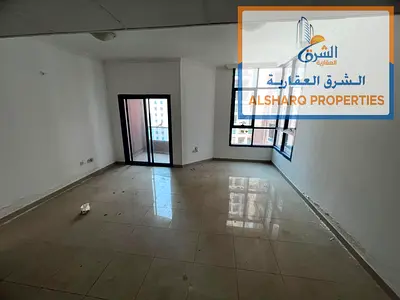 A spacious 1-bedroom apartment is available for annual rent in Al Nuaimiya Towers, Al Nuaimiya 1, close to Al Hikmah School. The apartment offers a pr