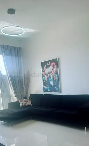 Black L-shaped Sofa — Good Condition, Modern Design