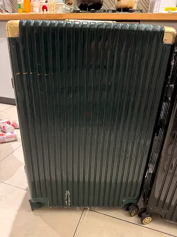 Large hard-shell wheeled suitcase (used) - dark green - Size 28
