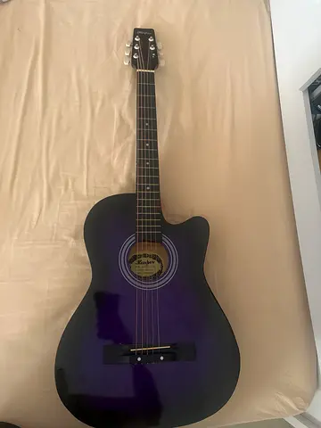 FREE DELIVERY IN DUBAI Used purple acoustic guitar - cutaway, good condition (missing string)