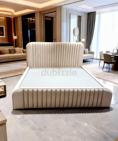 Modern upholstered queen bed with vertical channel-tufted headboard (cream)