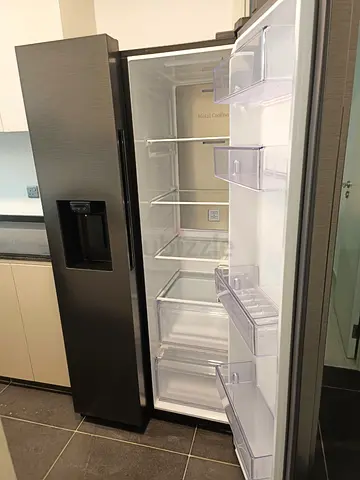 Samsung American Side-by-side Refrigerator with Water Dispenser ice maker — Good Condition