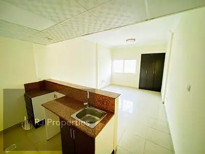 Spacious studio apartment - family building - ready to move - easy access for Dubai