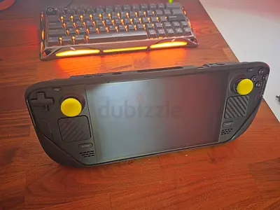 Steam Deck (handheld gaming PC) - Good condition, extra thumbgrips