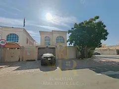 Corner villa for sale in Al Rawda 3 area, price includes electricity, water, and air conditioning. F