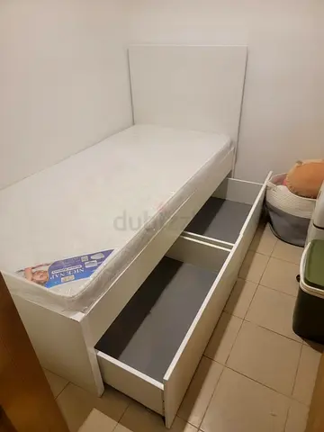 Single white bed with underbed drawers and mattress - good condition