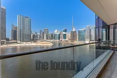 Exclusive Half-Floor Residence | Full Canal & Burj Views | Quiet Luxury