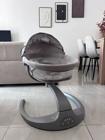 Gray electric baby rocker/swing in brand new condition