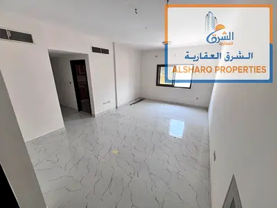 One bedroom and living room, second occupant, in a new building in Al Nuaimiya 2, with a large area, central air conditioning, and maintenance include