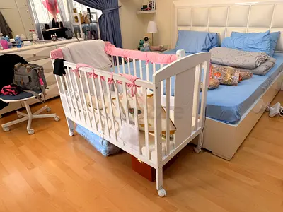 White Wooden Baby Crib on Wheels - perfect Condition with free matress sheets and cribs protection