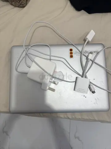 Used MacBook Pro 13" (Silver) with chargers and adapters - needs inspection