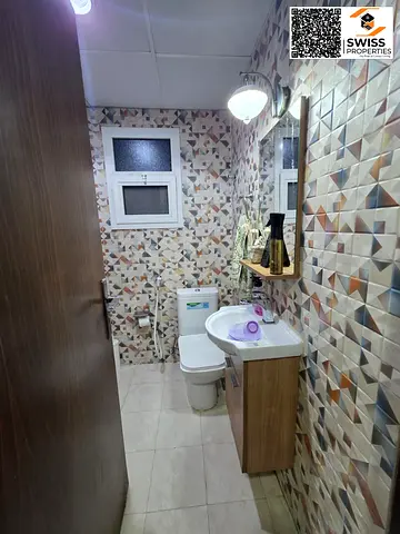 Spacious 3-bedroom apartment available for yearly rent in Oasis Tower 2, Al Rashidiya 1, Ajman.