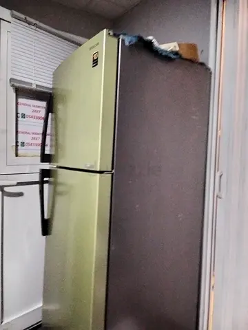 Silver double-door refrigerator, working condition, used