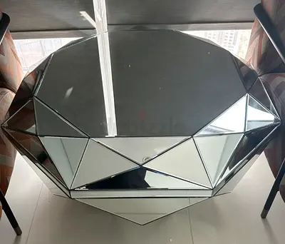 Geometric mirrored coffee table — diamond-cut design
