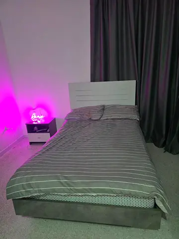 Single bed with headboard and bedside table and dressing table in very good condition
