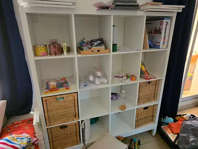Ikea 4x4 shelving unit with 4 baskets