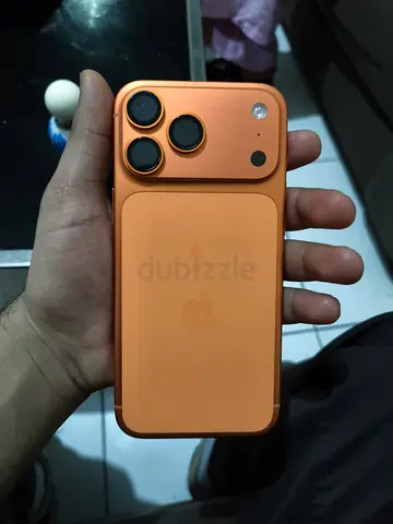 iPhone 17 pro max orange color (256gb) and camera lens protectors (best condition)