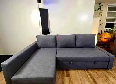 IKEA L shap Sofa store cum bed you can fix the storage lift or Right any side