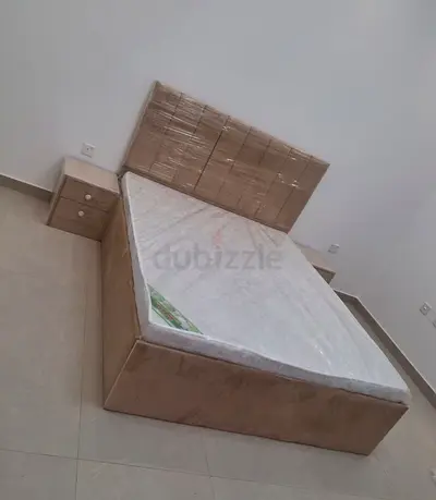 Queen bed frame with mattress and matching bedside tables - light beige