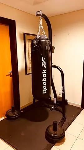 Reebok heavy punching bag with sturdy stand and weights - used