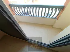 Annual rental in Al Majaz 2 two bedroom apartment with spacious living room two balconies open view 