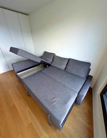 IKEA l shaped sofa bed with storage