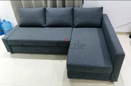 Gray L-shaped Sofa with Storage — Good Condition