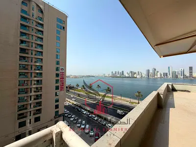 2BR Apartment in Al Majaz 3 with Direct Al Qasba Views, Prime Location, Upscale Tower, Discounted Price, and Family-Friendly Layout.