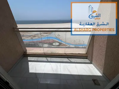 Directly on Ajman Corniche Three-bedroom apartment with a living room First occupancy Sea view 60,000 AED In 4 or 6 installments Excellent direct sea