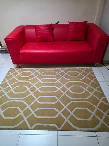 Beige geometric area rug - good condition, medium size