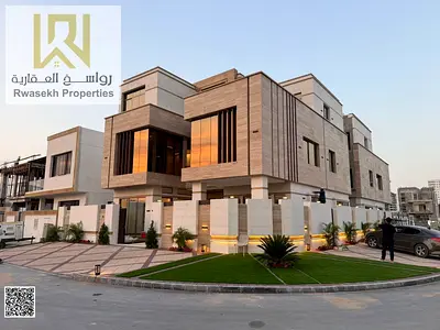 Villa for Sale – Professional Description A luxurious corner villa for sale in Al Yasmeen – Ajman, featuring a modern design and high-quality finishe