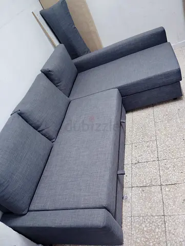 L-shaped grey fabric sofa with chaise - good condition