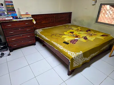 Solid wood double bed with matching dresser - good condition