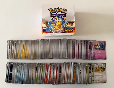 Pokemon card SURGING SPARKS original holographic shiny cards eevee