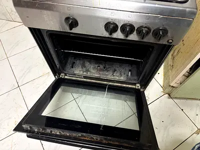 Used freestanding gas oven and stove - needs cleaning, small burner need repair