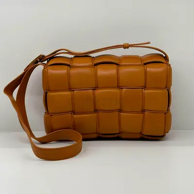 Bottega Veneta Padded Cassette Bag in Nappa Caramel